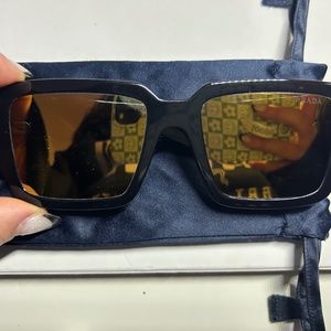 Exclusive to Prada sunglasses